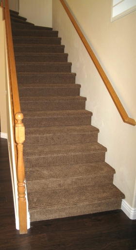 Darker carpet on stairs